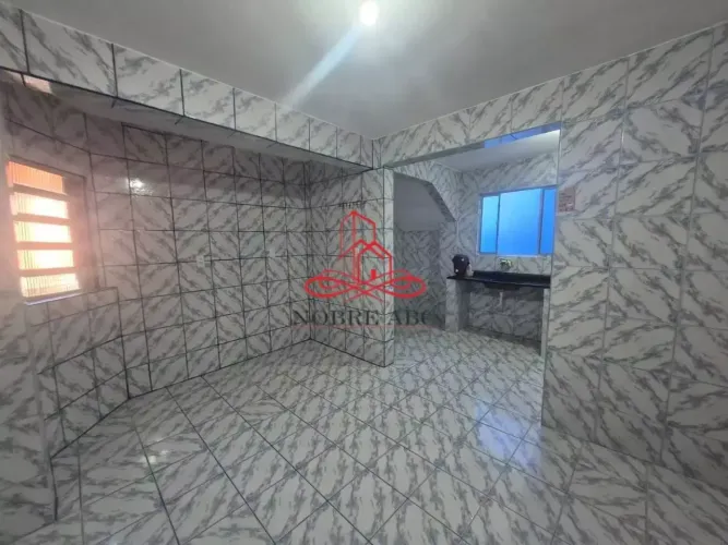 Sobrado para aluguel possui 80 metros quadrados com 1 quarto em Vila João Ramalho - Santo