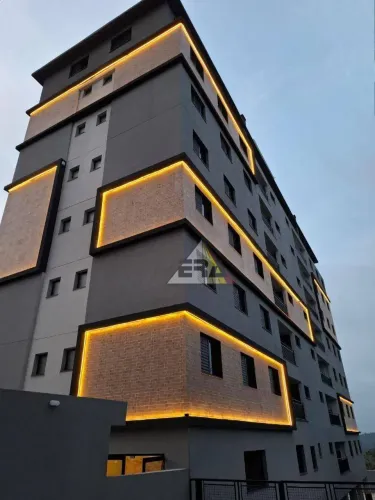 Apartamento com 2 dormitórios para alugar, 59 m² por R$ 2.861,90/mês - Jordanópolis - Aruj