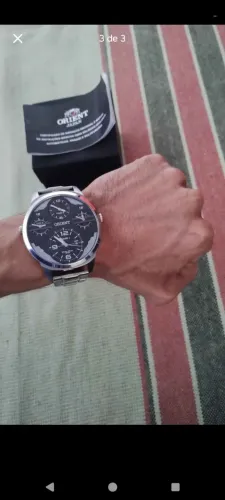 Relógio Orient inox