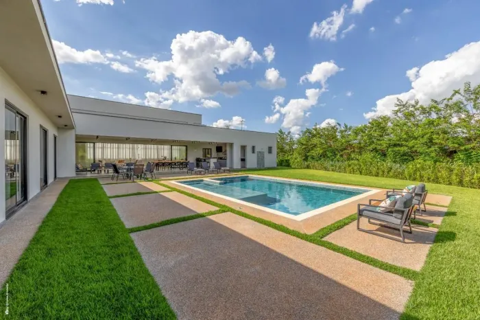 Casa com 5 dormitórios à venda, 490 m² por R$ 5.600.000,00 - Condomínio Fazenda Alvorada -