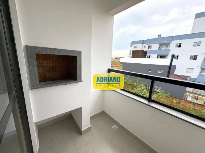 Apartamento com 2 dormitórios para alugar, 59 m² por R$ 2.838,98/mês - Areias - São José/S