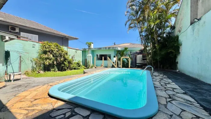 Casa com 2 dormitórios à venda, 228 m² por R$ 950.000,00 - Costeira do Pirajubaé - Florian