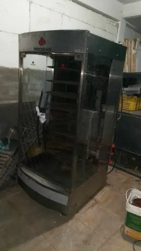Máquina de assar carne giratoria