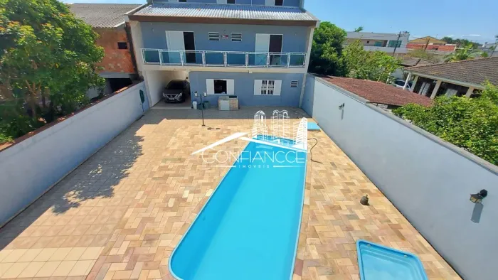 Casa com piscina à venda em Guaratuba, PR | Confiancce Imóveis