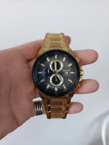 Relógio Oriente Série ouro na caixa 