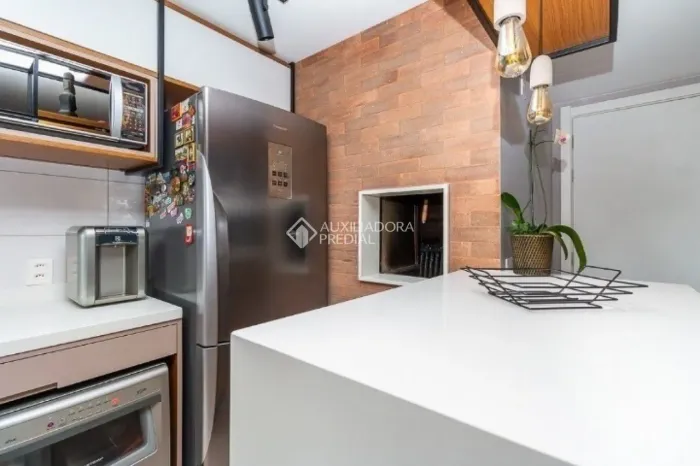 Apartamento de 2 quartos e 2 vagas na cidade Baixa com total infraestrutura.