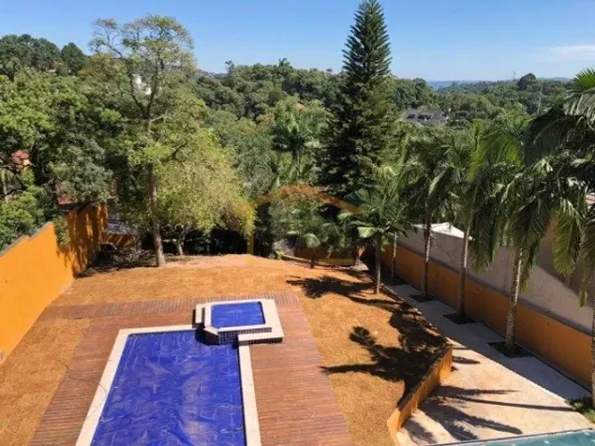 Venda de Casa em Condominio em Mairiporã-SP, bairro Alpes Da Cantareira com 560m² Área Con