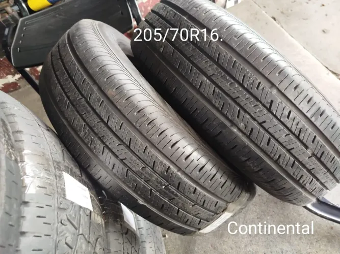 Pneu aro 16". 205/70R16 Continental meia vida