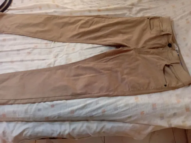 Calça slim ,/Novo nunca foi usada ,, Tel *