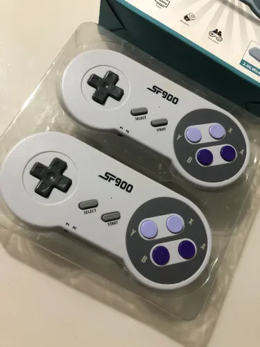 Vendo game controle com mais de mil jogos. Valor : 150 (98)9 *
