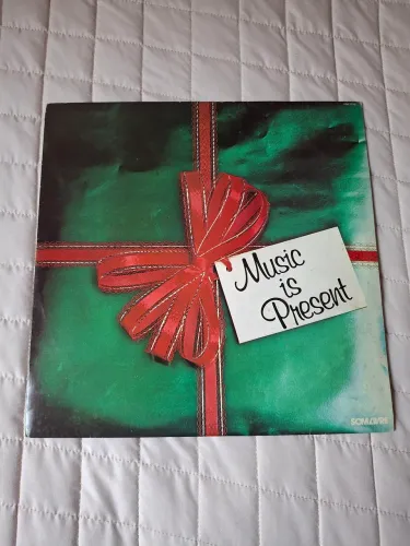 Disco de Vinil MUSIC IS PRESENT