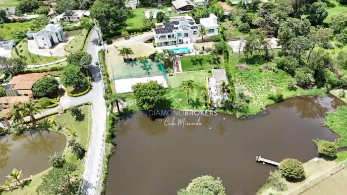 Casa com 7 dormitórios à venda, 550 m² por R$ 3.300.000,00 - Condomínio Vale do Ipê Amarel