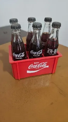 Coca Cola garrafas em miniatura
