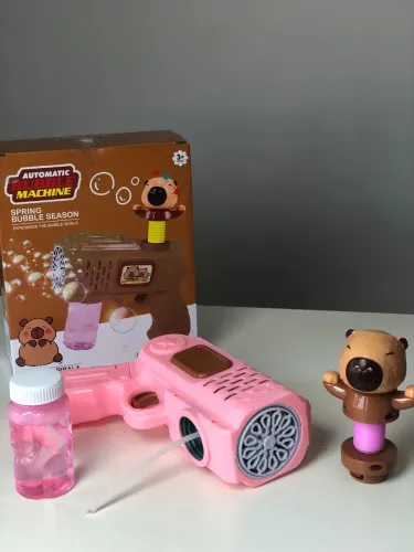 Pistola automática lança bolhas de sabão 