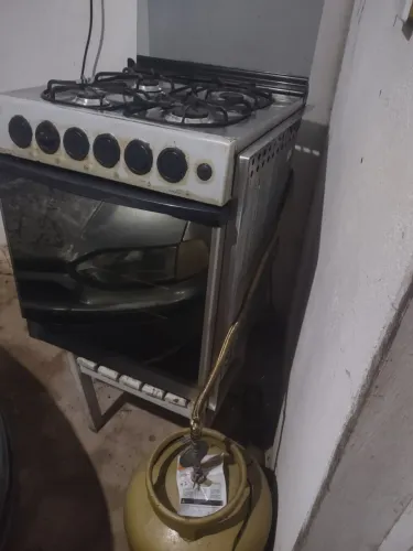 Fogão e forno inox general elétrico 4 queimadores.obs ainda vai com a mangueira de aço