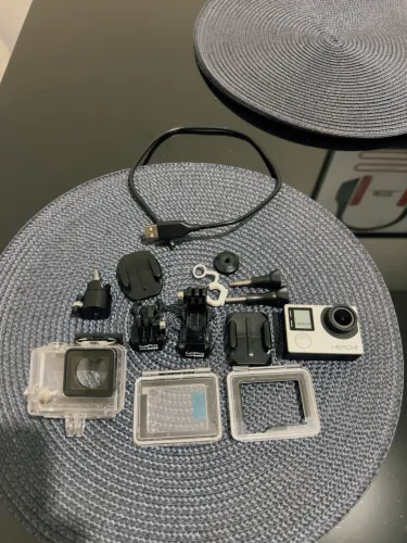 Go Pro Hero 4 (liga fica c tela preta) + equipamentos