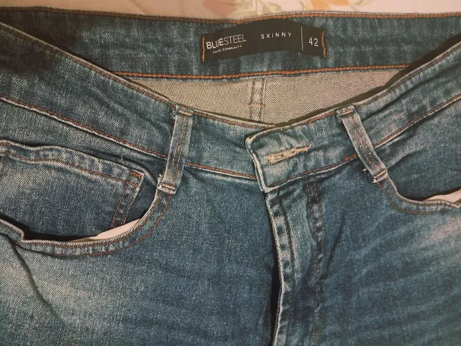 Excelente calça masculina Tam 42