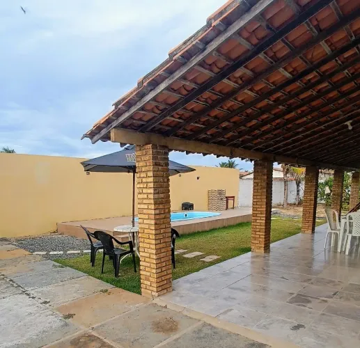 Casa na praia do peito de moça para família pequena