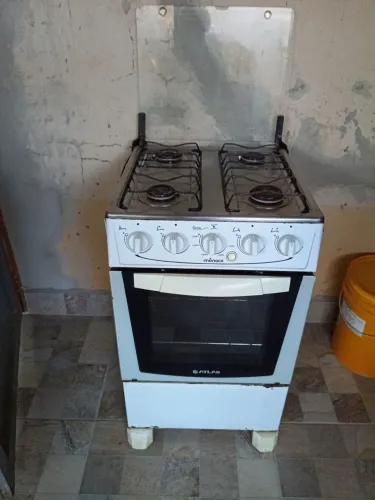 Vendo fogão Mônaco elétrico funcionando perfeitamente ou troco  mesa de jantar 6 cadeiras