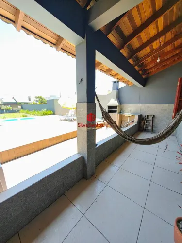 Casa de 2 dormitórios disponível para locação temporada em Xangri-lá, bairro Zona Nova. RE