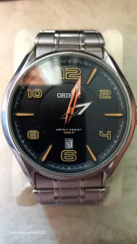Vendo relogio oriente semi novo valor 200 reais