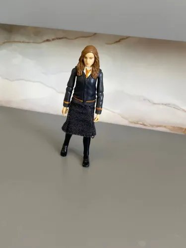 Boneca Hermione saga Harry Potter