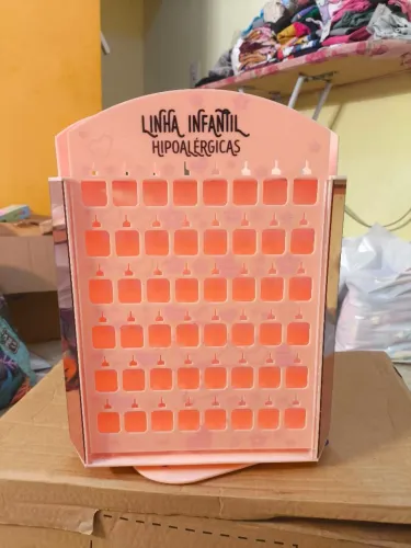 Expositor de brincos giratório