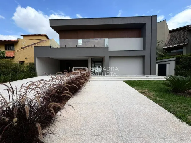 Casa de condomínio com 410 m², 4 quartos sendo 4 suítes à venda no bairro Alphaville 2.