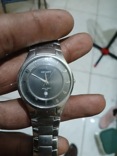 Vendo relógio orient funcionando perfeitamente 
