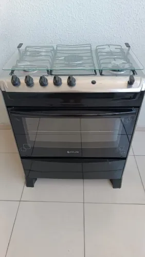 Fogão atlas 5 bocas manual muito bem conservado..