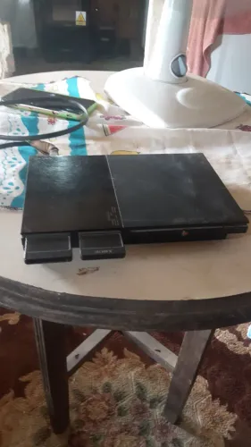 Vendo ps2 bloqueado com pen drivepor 450 Reis faço oferta