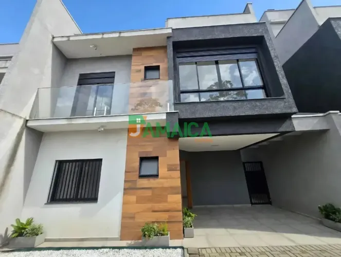 Sobrado novo em condomínio fechado com 112 m², 1ª locação, localizado na Rua Clóvis Bevilá