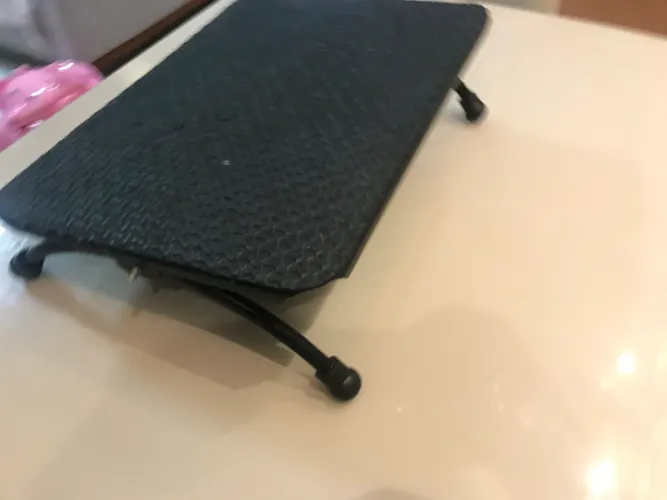 descanso ergonômico para os pés