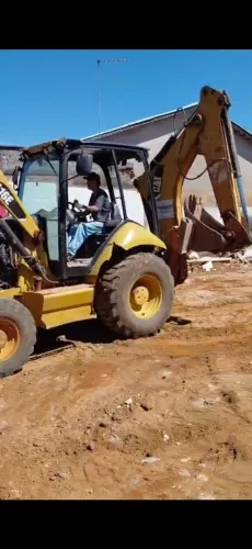 Retro escavadeira Cat 2014