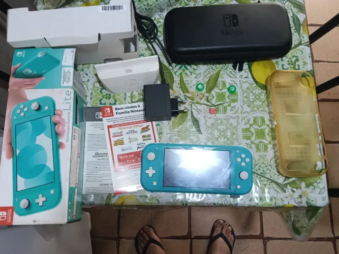 Nintendo switch lite 1200 reais troco por ps4