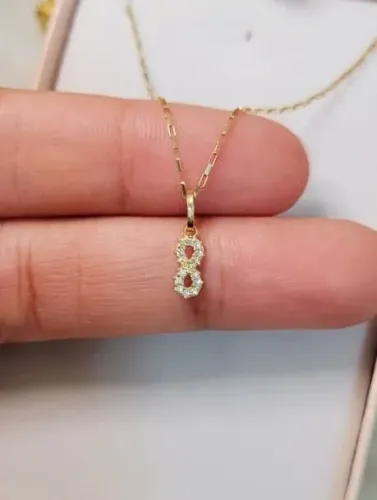 Colar Infinito mini com zircônias, Cartier bloquinho Ouro 18k