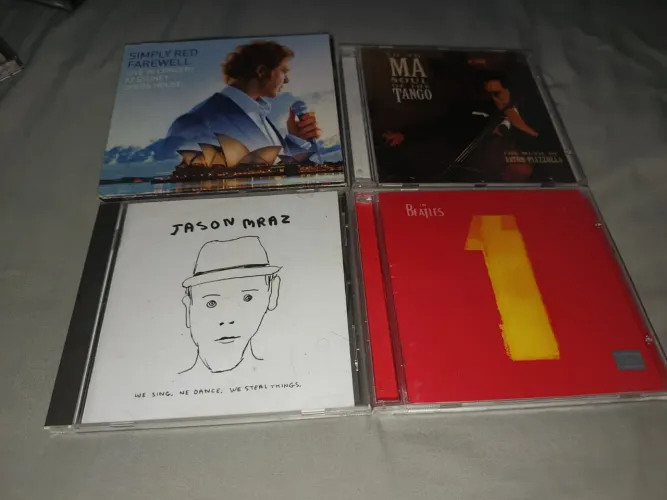 Coleção de Cds Beatles / Jason Braz / Simply Red<br>Jason Braz R$ 25<br>The Beatles One R$ 30