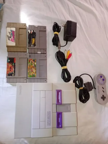 Vendo super Nintendo completo funcionando perfeitamente passo cartão com entrega grátis