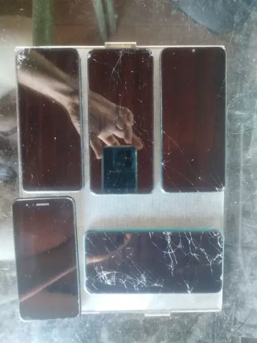 5 Celulares pra peça ou conserto