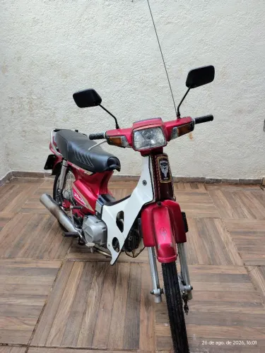 Honda Dream cor Vinho 1995 em bom estado de conservação