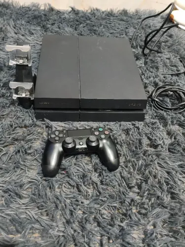 Vendo PS4 1tera super bem conservado