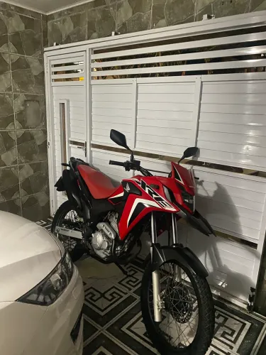 Xre rally ano 2023 único dono pneus e relação novos