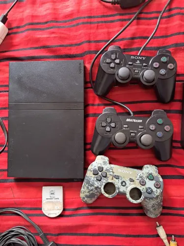PS2 com combo de jogos