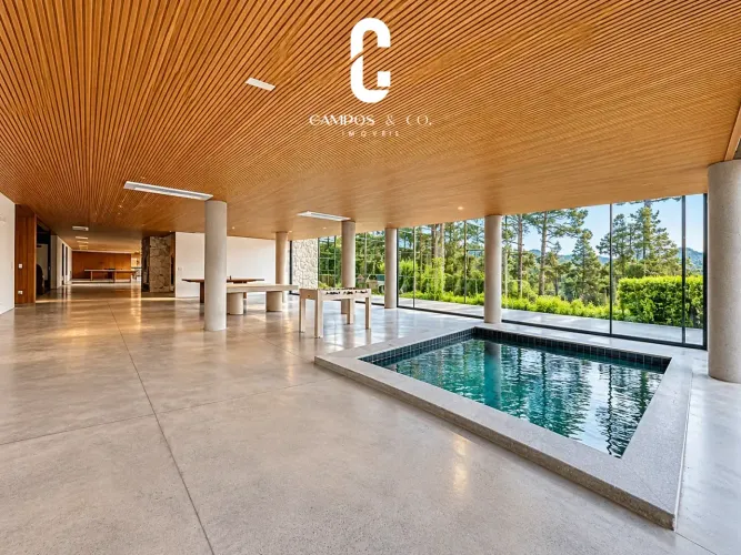 Mansão contemporânea com 1.280 m² em terreno de 10.055 m² na Vila Simonsen Campos do Jord