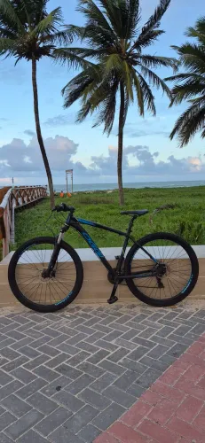 Bicicleta Oggi hacker Hds<br>Freio hidráulico<br>Quadro TAM 19<br>Passadores Shimano MT 200