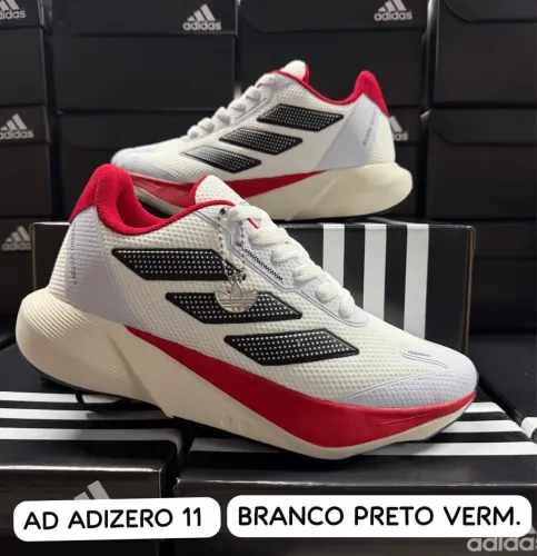 Tênis esportivo adidas branco com vermelho