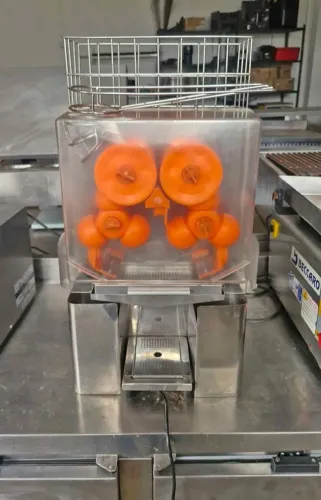 Máquina espremedor de suco laranja