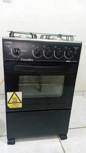 Fogão preto 4 bocas semi-novo entrego gratis