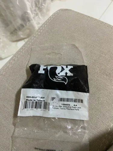 Topcap Grip Fox PTU aperte para destravar 
