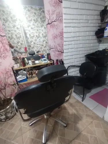 Cadeira de Cabeleireiro, ou Barbeiro.